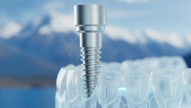 A photorealistic image of a metallic dental implant post being placed into a minimalist jawbone model, emphasizing precision. In the very blurred background, an iconic New Zealand mountain range is visible under a bright sky. The scene is clean, modern, and highlights advanced dental technology. No text or logos are present.