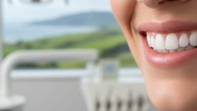 Close-up image of a radiant, naturally white and healthy smile. The focus is on the teeth and lips, set against a softly blurred background hinting at a clean dental clinic and a distant New Zealand landscape.