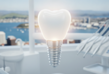 A close-up of a perfectly white, healthy tooth with a subtle, glowing representation of a dental implant's root structure, set against a softly blurred background of Wellington's harbor and city skyline on a bright day.