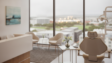 A photorealistic image of a clean, modern dental clinic interior with a large window showing a blurred cityscape in the background. The scene suggests a professional and welcoming environment for dental care. No visible text.